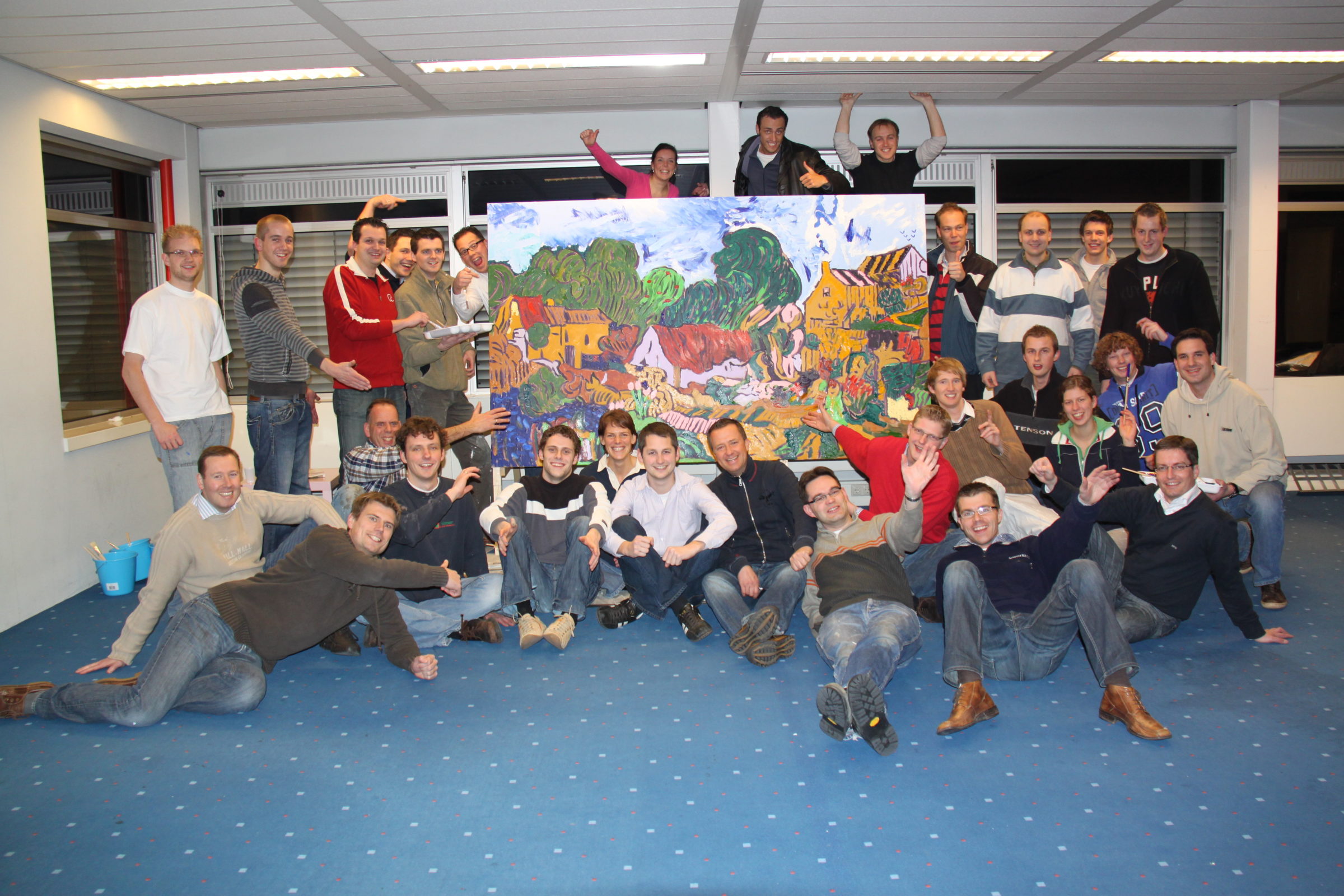 Team met schilderij